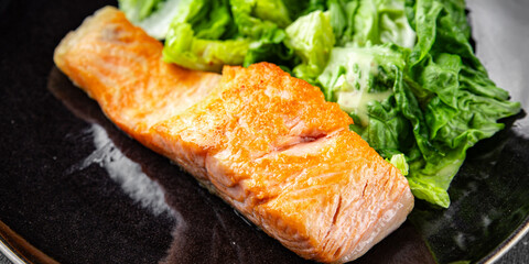 Salmon fried fish seafood dish fresh delicious gourmet food background on the table rustic food top view copy space keto paleo diet vegetarian food pescetarian diet