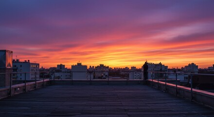 Fototapeta premium Urban Rooftop Sunset Silhouette