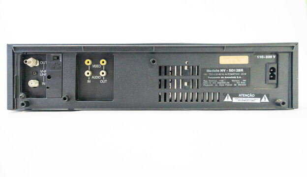 Suzano, Sao Paulo - Brazil - july 13, 2024: VCR with old VHS tapes and remote control