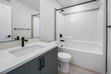 Bathroom with a white toilet and sink