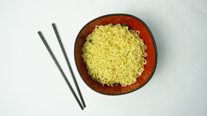 Noodles in a black bowl