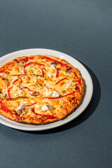 Tasty pizza on gray background, top view. Space for text