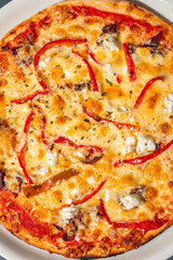 Tasty pizza on gray background, top view. Space for text
