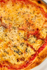 Tasty pizza on gray background, top view. Space for text