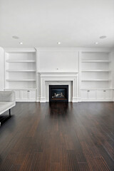 Large living room with a fireplace and a couch