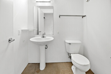 Bathroom with a white toilet and sink