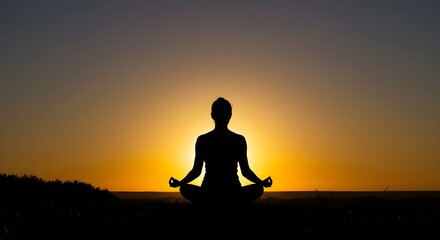 Silhouette of a person meditating in a yoga pose during sunrise, symbolizing inner peace, mindfulness, and spiritual balance in a calm natural setting.