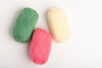 Green, pink and yellow yarn ball