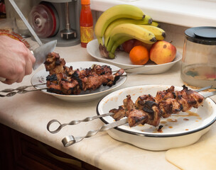 fresh shashlik is removed from the skewer