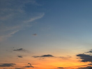Beautiful sky with natural gradations. Thick clouds in the dusk sky on a winter night. Image of a cloudy sky in the afternoon. View of the night sky with golden light from the evening sun