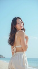 Asian Women with beautiful skin in the carefree time, Cheerful on the beach.