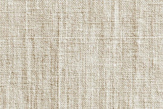 Light beige linen fabric's woven texture is showcased.