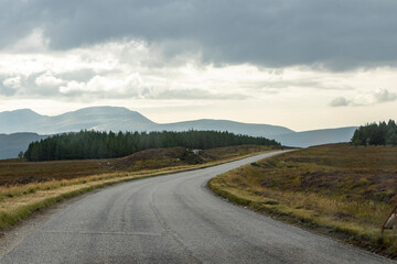 Winding through the Scottish Highlands, the road unveils green pastures, roaming wildlife, and vast unspoiled landscapes. A journey through raw beauty, freedom, silence,nature, timeless wilderness.