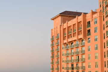 Fototapeta premium orange hotel at sunset
