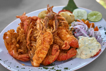 Peruvian Camarones Fritos, or fried shrimp, is a delicious and popular dish that features crispy and flavorful shrimp. Peruvian cuisine is known for its vibrant and diverse flavors.