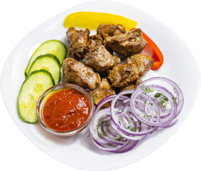 grilled meat with vegetables on a plate