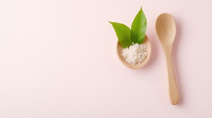 Natural sea salt in a small wooden bowl with leaves