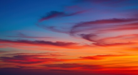 Obraz premium Colorful Sunset Sky with Orange and Red Clouds