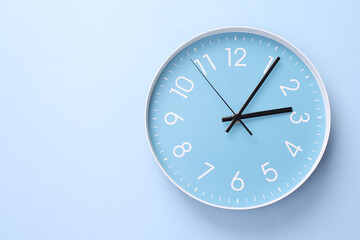 Close-up of a wall clock. The concept of time and work time is valuable for life, Alarm clock...