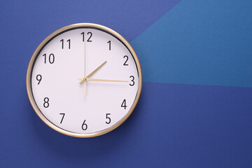 Close-up of a wall clock. The concept of time and work time is valuable for life, Alarm clock...