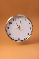 Close-up of a wall clock. The concept of time and work time is valuable for life, Alarm clock...