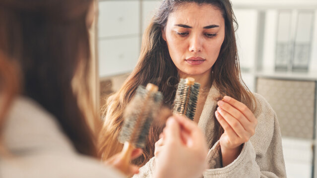 Young woman with hair problems	