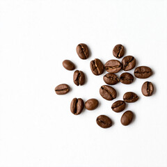 Fototapeta premium Roasted Coffee Beans Scattered on White Background – Brown Coffee Beans for Pattern, Texture, and Design