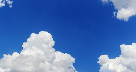 Naklejka premium White clouds in the blue sky