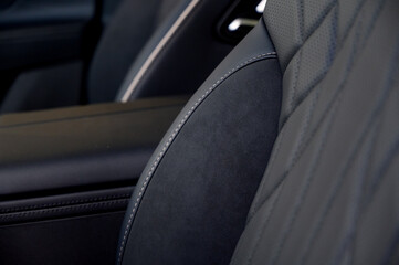 Close-up of black leather seat of modern car