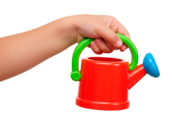 Child's hand holding a colorful plastic watering can against a plain background while preparing to water plants on a transparent background.