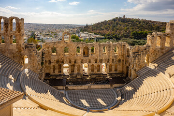 The Roman theater of Odeon of Herodes Atticus in the foreground and the Filopappou Hill in the...
