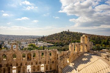 The Roman theater of Odeon of Herodes Atticus in the foreground and the Filopappou Hill in the...