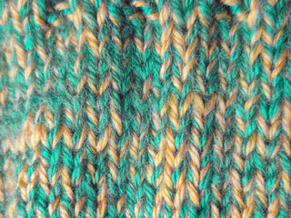 This is a Colorful and Vibrant Knitted Fabric Design featuring Green and Yellow Patterns