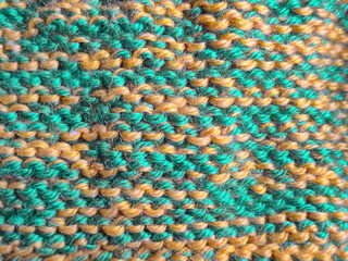 Fototapeta premium This is a Colorful and Vibrant Knitted Fabric Design featuring Green and Yellow Patterns