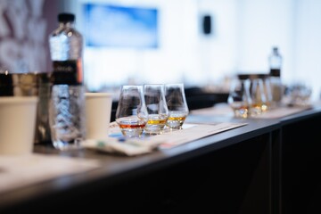 Tasting session featuring a variety of spirits and refreshments at a conference