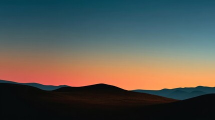 Fototapeta premium A serene sunset landscape showcasing rolling hills in soft hues of blue and orange.
