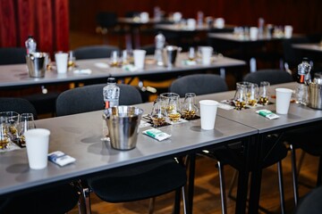 Celebration setup with drinks, glasses, and refreshments in a formal setting
