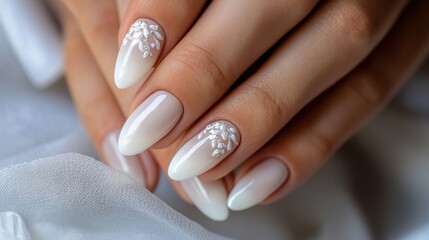 A woman's hand with a manicured nail and a flower design