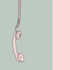 Pink vintage telephone receiver hanging by its wire