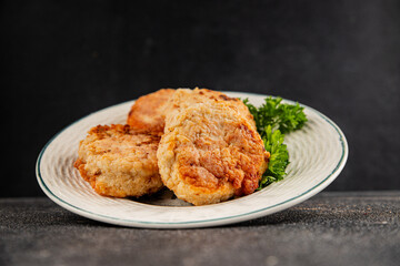 Meat cutlets pork, beef, chicken, lamb fried meat dish fresh delicious gourmet food background on the table rustic food top view copy space