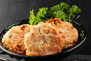 Meat cutlets pork, beef, chicken, lamb fried meat dish fresh delicious gourmet food background on the table rustic food top view copy space