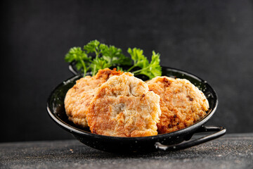 Meat cutlets pork, beef, chicken, lamb fried meat dish fresh delicious gourmet food background on the table rustic food top view copy space