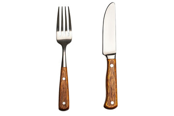 Naklejka premium A rustic elegance: a simple yet sophisticated knife and fork set with warm wooden handles against a stark white background.