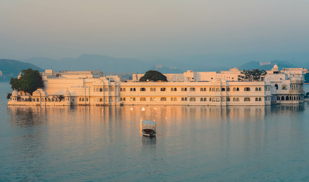 Sun rise in the morning at Taj Lake Palace on Lake Pichola in Udaipur, India