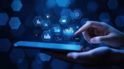 Naklejka premium Analyzing data with a tablet in a blue futuristic environment for business strategy