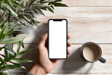 Smartphone Mockup: Blank Screen on Wooden Table with Coffee and Plant