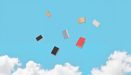 Books gracefully floating in clear blue sky, freedom of imagination