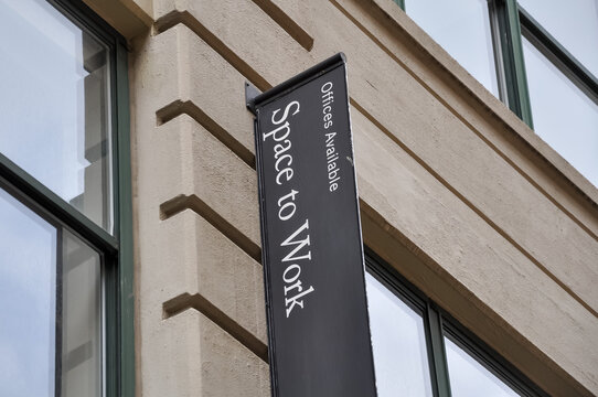 Offices available sign in front of the building
