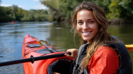 Smiling Woman Kayaking on River in Nature with Green Trees and Blue Sky in the Background