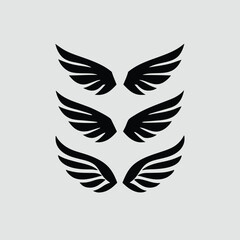 Three Sets of Black Wings Graphic Design Elements